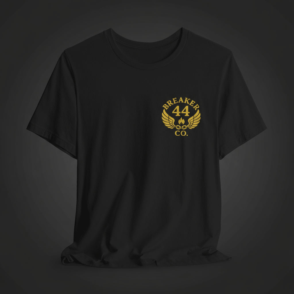 Black t-shirt with gold logo and text on a dark color background