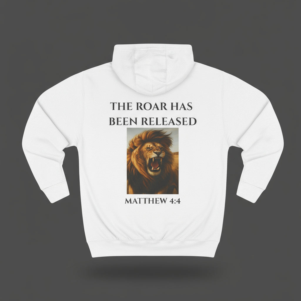 White hoodie with a lion graphic and text on a dark studio background