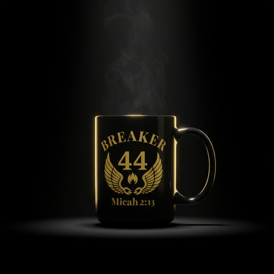 Black mug with gold text and design on a white background